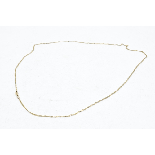 309 - 9ct gold fine chain, 2.1 grams, 61cm long.