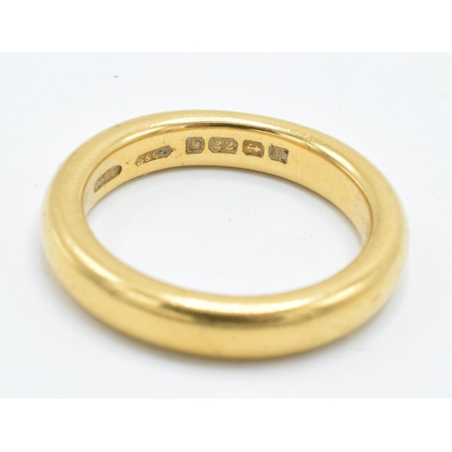 310 - 22ct gold wedding band, 9.8 grams, size O.