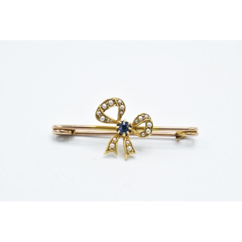 340 - 9ct gold brooch with bow, set with a sapphire and pearls, 2.3 grams, 3.5cm wide.