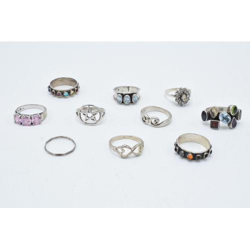 372 - A good collection of silver rings, set with various stones in multiple styles and sizes, 32.1 grams ... 