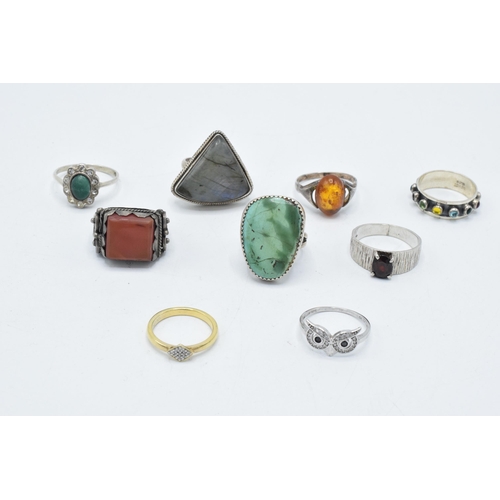 373 - A good collection of silver rings, set with various stones in multiple styles and sizes, 44.4 grams ... 