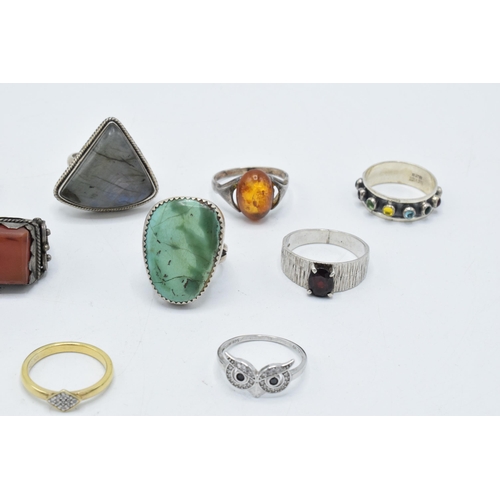 373 - A good collection of silver rings, set with various stones in multiple styles and sizes, 44.4 grams ... 