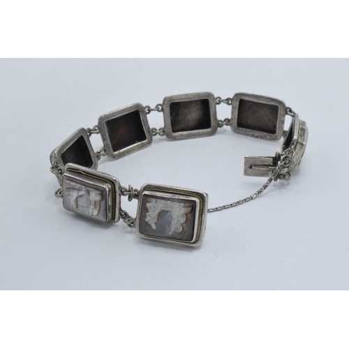 375 - Silver .800 bracelet with Mother of Pearl carved panels, approx 20cm long.