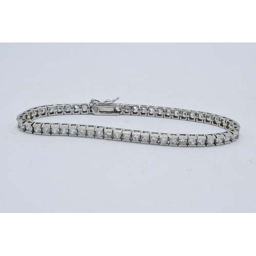 376 - Silver ladies tennis bracelet with semi precious stones, 20cm long.