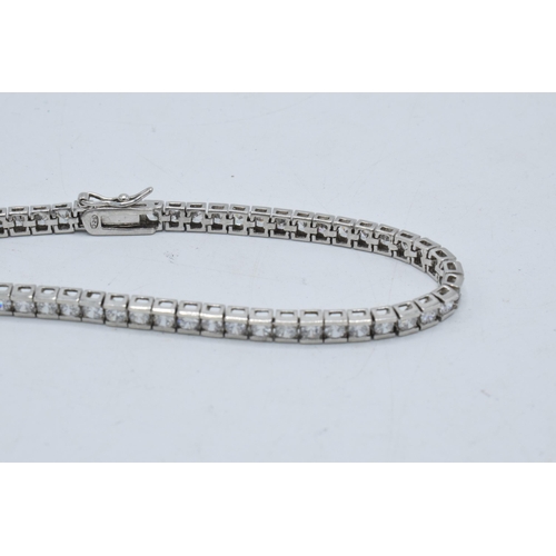 376 - Silver ladies tennis bracelet with semi precious stones, 20cm long.