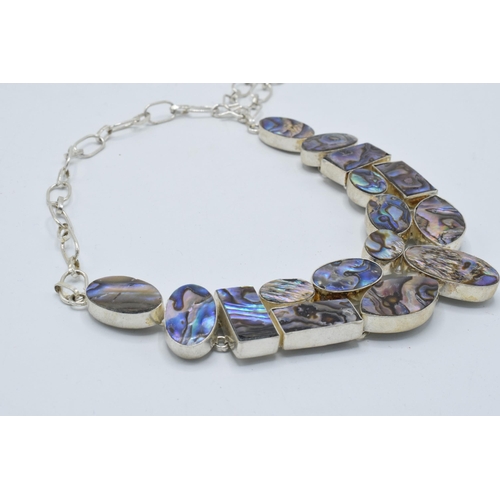 378 - A chunky silver ladies necklace set with abalone panels, 14cm wide.