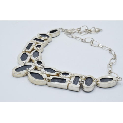 378 - A chunky silver ladies necklace set with abalone panels, 14cm wide.