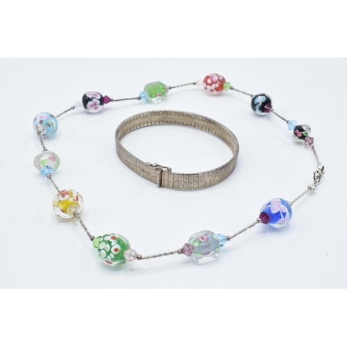 379 - A silver ladies bracelet together with silver and white meal murano-style glass beads necklace, 43cm... 