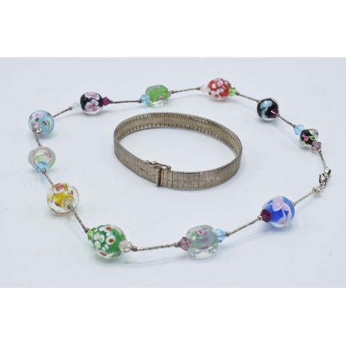 379 - A silver ladies bracelet together with silver and white meal murano-style glass beads necklace, 43cm... 