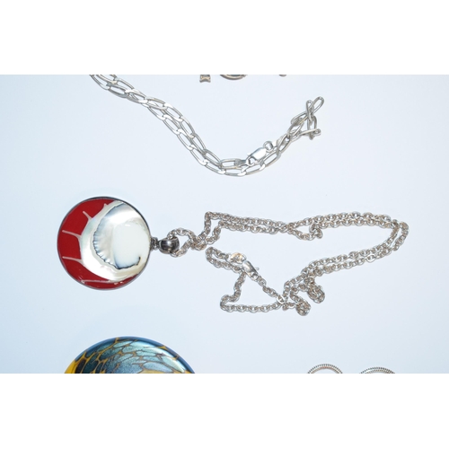 392 - A trio of silver necklaces to include an Okra glass style pendant on chain, together with 2 others (... 