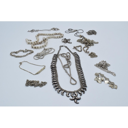 394 - A collection of silver chains and necklaces of varying lengths and styles, 190.8 grams.