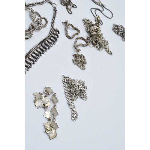 394 - A collection of silver chains and necklaces of varying lengths and styles, 190.8 grams.