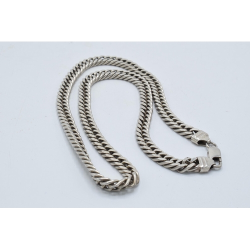 396 - Silver curb link chain, 66.5 grams, 51.5cm long.