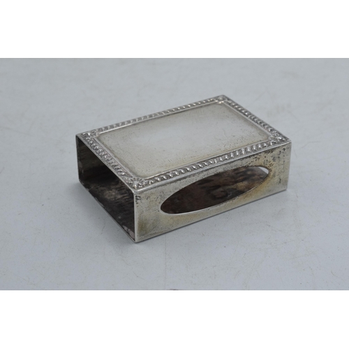41 - Sterling silver matchbox case with ornate border, 14.8 grams, 5cm long.