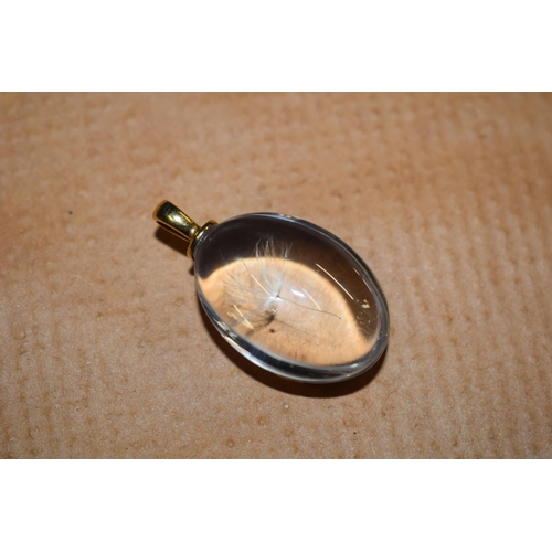 411 - A modern novelty dandelion seed pendant, with gilt-metal mount, 34mm long.