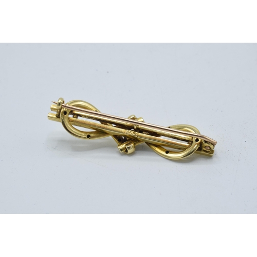 414 - 15ct gold bar brooch. 3.3 grams, 4.5cm wide.