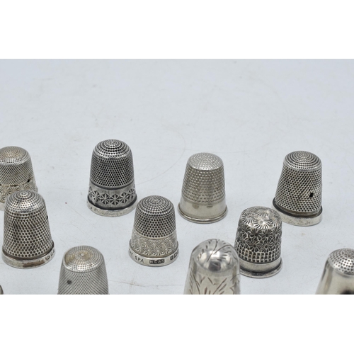 70 - A collection of silver thimbles to include a set of three with etched star, by Henry Griffiths and S... 