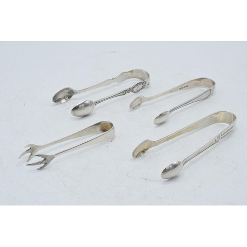 72 - A collection of hallmarked silver sugar tongs to include a pair with scaled claw nips and other desi... 