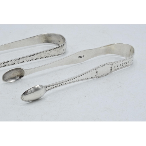 73 - Two pairs of Scottish silver tongs to include a Georgian pair of plain form, Edinburgh 1805, hallmar... 