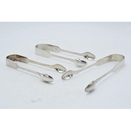 75 - Three pairs of Victorian sugar tongs to include a pair with foliate engraving, Martin, Hall & Co She... 