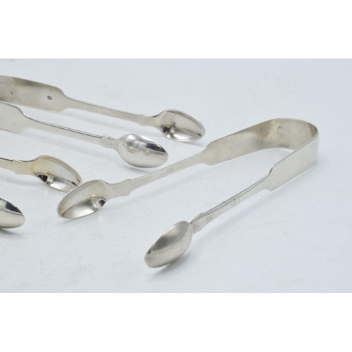 75 - Three pairs of Victorian sugar tongs to include a pair with foliate engraving, Martin, Hall & Co She... 