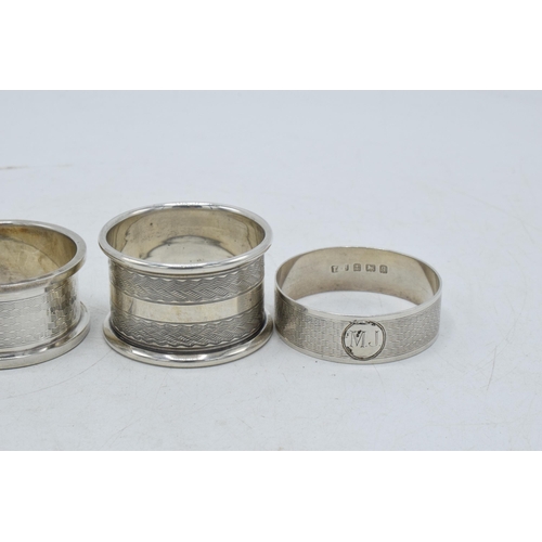 78 - A selection of silver napkin rings to include Rolason Brothers Birmingham 1924, Hazlewoods Birmingha... 