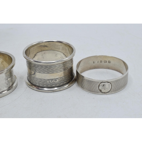 78 - A selection of silver napkin rings to include Rolason Brothers Birmingham 1924, Hazlewoods Birmingha... 