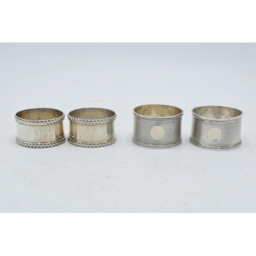 81 - 2 pairs of silver napkin rings to include James Deakin of Chester 1903 together with William Hutton ... 