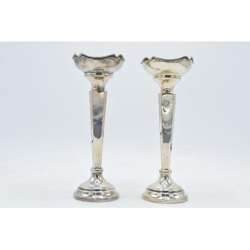 84 - A pair of hallmarked silver vases with shaped rims, Birmingham 1917, Sanders and MacZenzie, 18cm tal... 