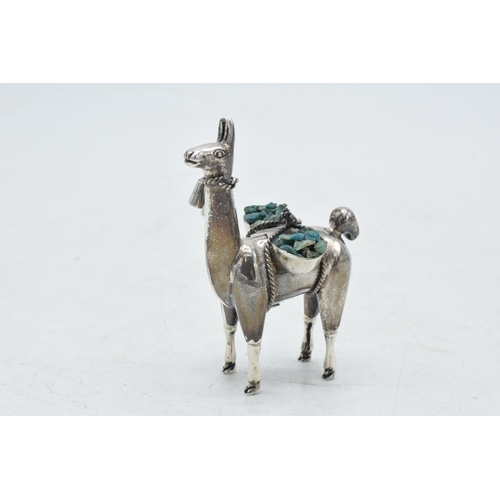 87 - Silver model of a llama carrying materials, gross weight 27.4 grams, 6cm tall.