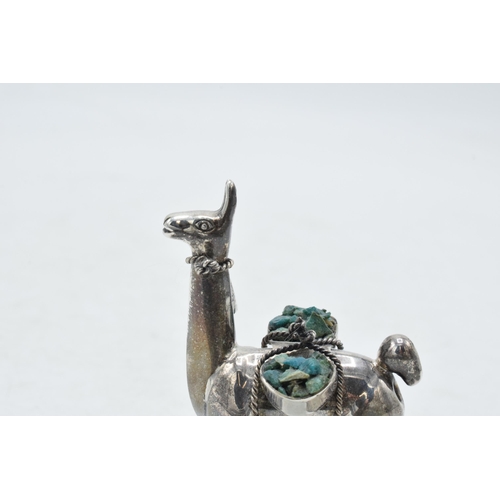 87 - Silver model of a llama carrying materials, gross weight 27.4 grams, 6cm tall.