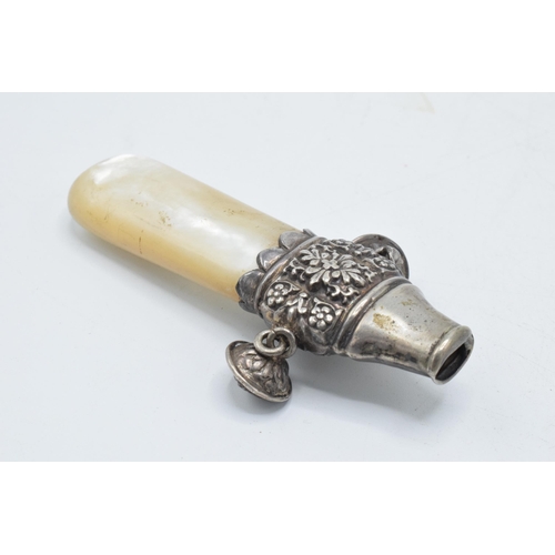 91 - Hallmarked silver baby rattle and whistle with Mother of Pearl handle.