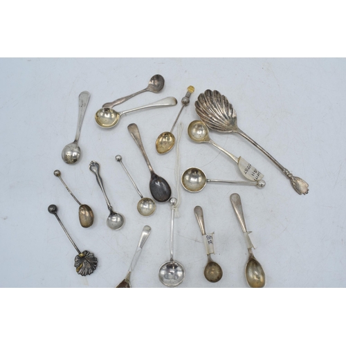 92 - A collection of silver condiment spoons of varying ages and designs, mostly hallmarked, approx 55 gr... 