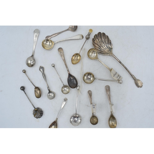 92 - A collection of silver condiment spoons of varying ages and designs, mostly hallmarked, approx 55 gr... 