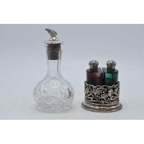 95 - Silver topped scent bottle with fish finial, Birmingham 1978, together with a silver plated set.