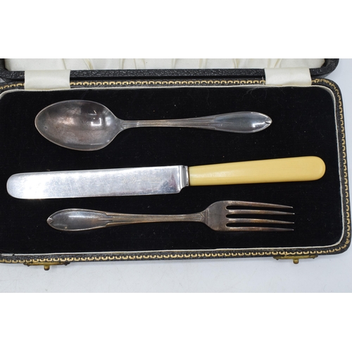 96 - A cased set of 6 silver handled butter knives, Sheffield 1926, together with a cased christening set... 