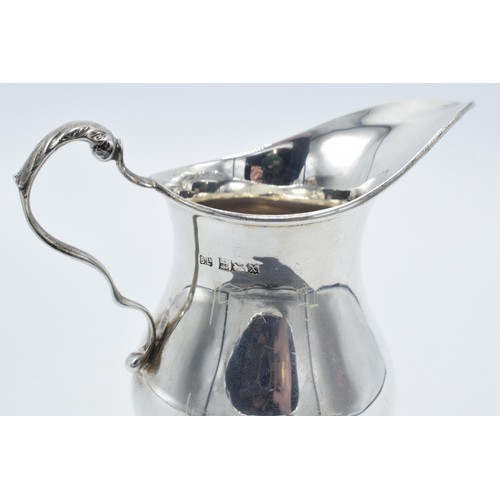 213 - Silver pedestal jug, Birmingham 1972, 107.7 grams, 13cm tall.