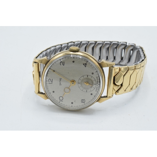 229A - Smiths 9ct gold cased wristwatch on gold plated metal strap, with inscription to rear.