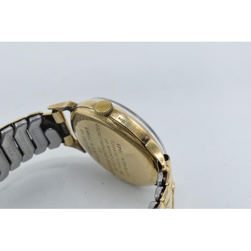 229A - Smiths 9ct gold cased wristwatch on gold plated metal strap, with inscription to rear.