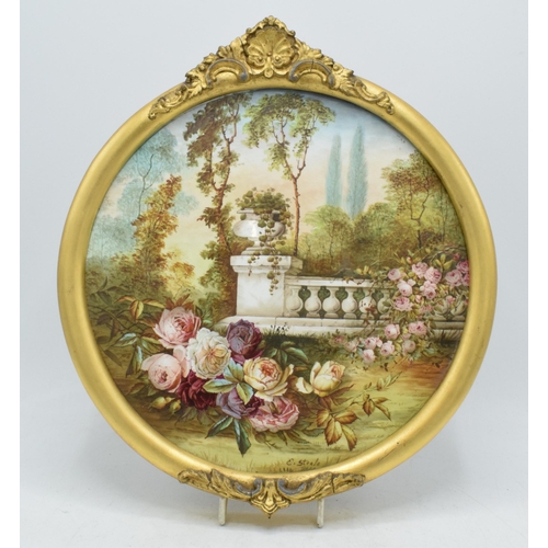 Edwin Steele painted porcelain plaque in gilt-style frame of a garden wall and foliage design, 33cm tall, signed bttom centre right.