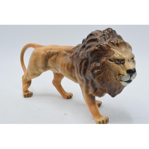 65A - Beswick lion together with Beswick trout 1032 (chipped) (2).