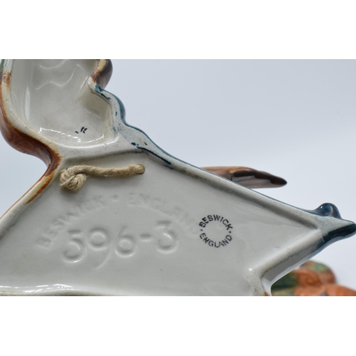 78 - Beswick flying mallard wall plaques to include 596-3 and 596-4 (this piece is damaged in several pla... 