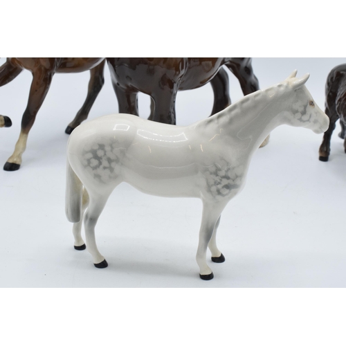 67 - Beswick horses to include brown shire 818, grey thoroughbred (13cm tall), a brown Shetland (ear af) ... 