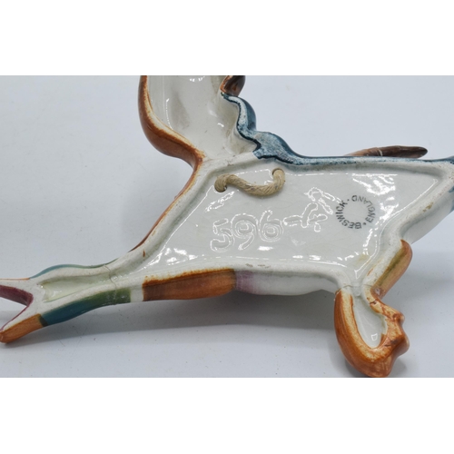 78 - Beswick flying mallard wall plaques to include 596-3 and 596-4 (this piece is damaged in several pla... 