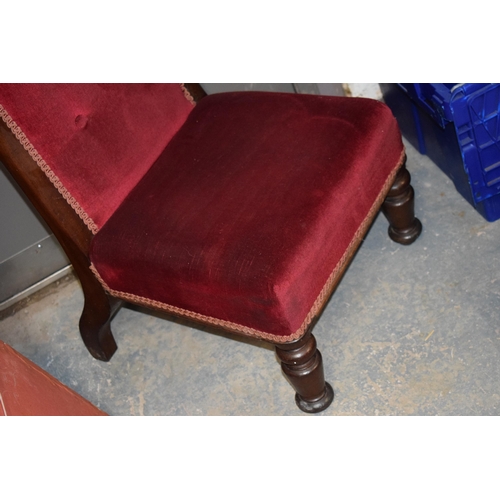 479 - French high backed low chair with upholstered decoration, 102cm tall.