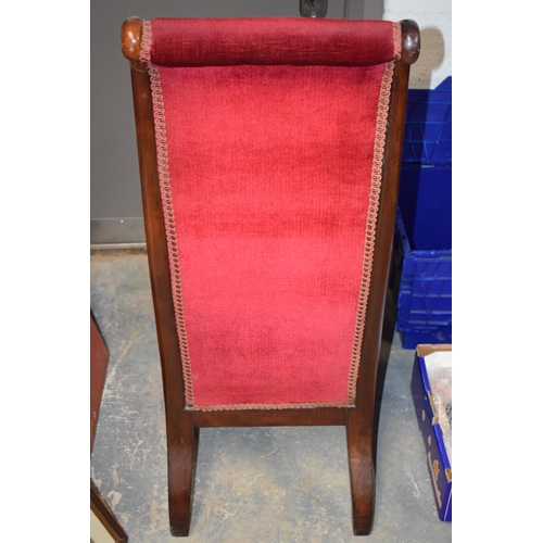 479 - French high backed low chair with upholstered decoration, 102cm tall.