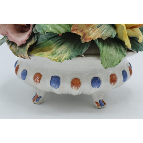 135 - Unusual Capo Di Monte flower bowl with similar unmarked figure of a boy, 28cm tallest (2).