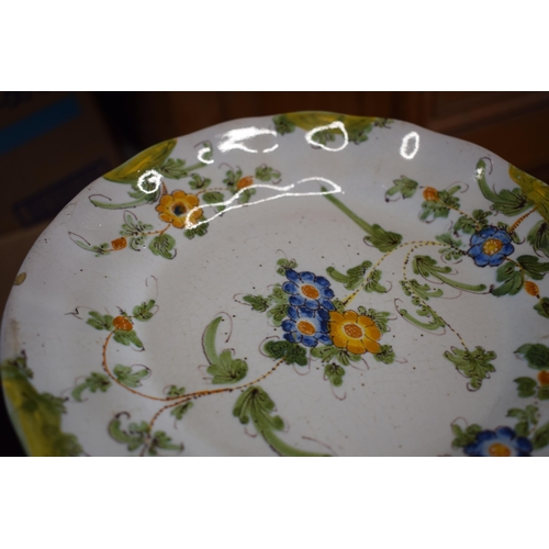 137 - A group of 5 18th century faience ware plates with floral designs and indistinct signature to rear (... 