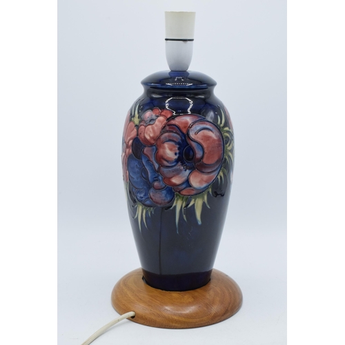 86 - Moorcroft pottery lampbase in the Clematis (or similar) floral pattern on turned wooden base, 28cm t... 