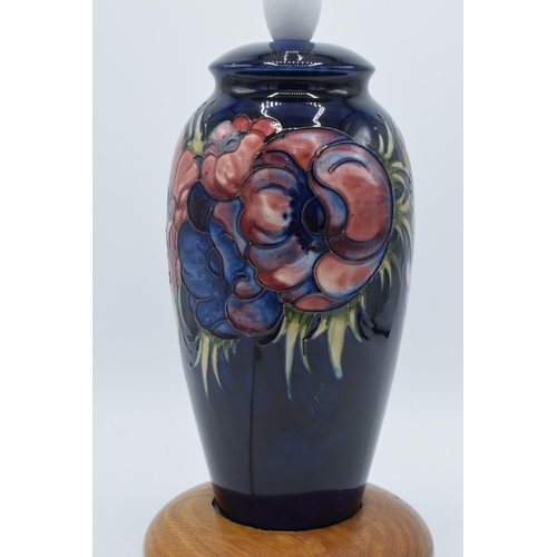 86 - Moorcroft pottery lampbase in the Clematis (or similar) floral pattern on turned wooden base, 28cm t... 